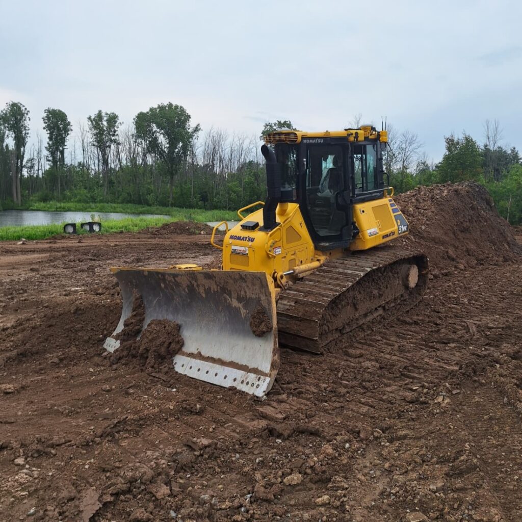 Bulldozer_Wet_Muddy_RocRents IMAGE- blog 2 image- sept